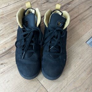 Jordan Black and Gold basketball shoes